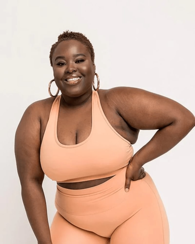 Front of a model wearing a size L Classic Venus Sports Bra in Caramel by Gold Elite Apparel. | dia_product_style_image_id:283816